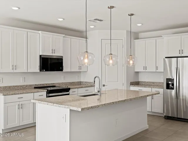 Photo is not of the actual home. Interior finishes and fixtures may vary.
