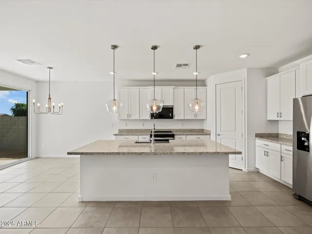 Photo is not of the actual home. Interior finishes and fixtures may vary.