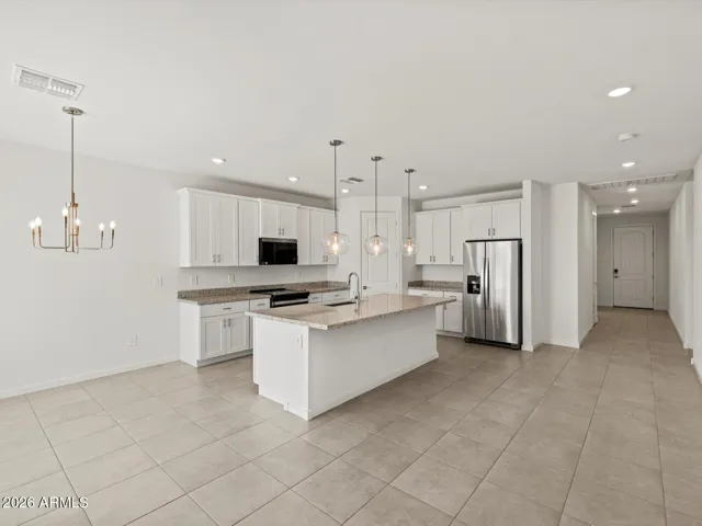 Photo is not of the actual home. Interior finishes and fixtures may vary.