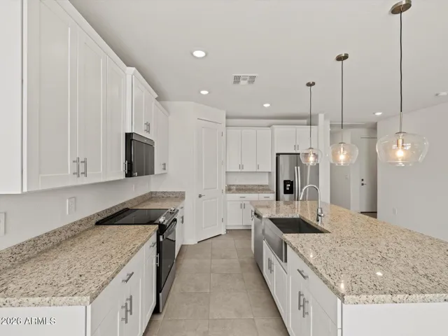 Photo is not of the actual home. Interior finishes and fixtures may vary.