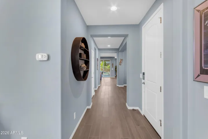Entry Hallway. Wood look tile plank floors