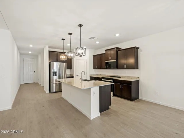 Photo is not of the actual home. Interior finishes and fixtures may vary.