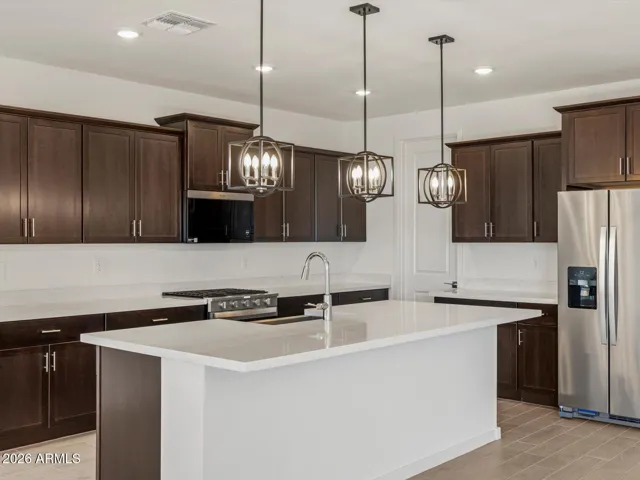 Photo is not of the actual home. Interior finishes and fixtures may vary.