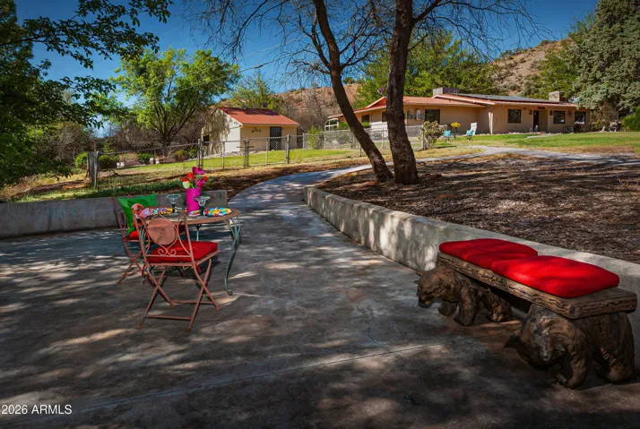 Quiet sitting area adjacent to the creeklike waterway.