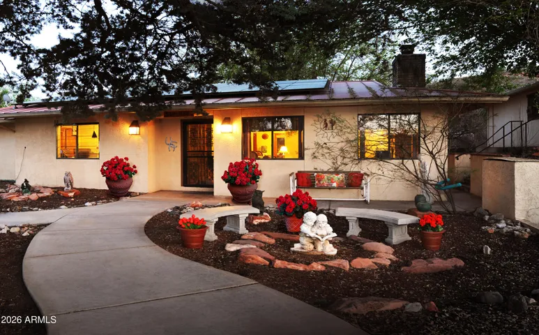 Charming 4 bedroom located on 1.64 acres bordered by waterway.