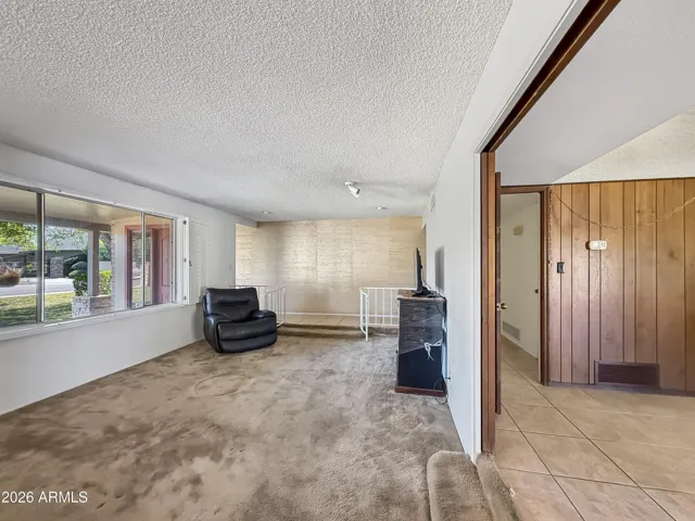 The formal living area opens to the family room.