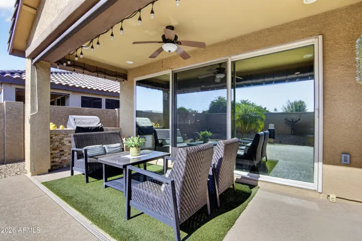 Patio with roll-down shade