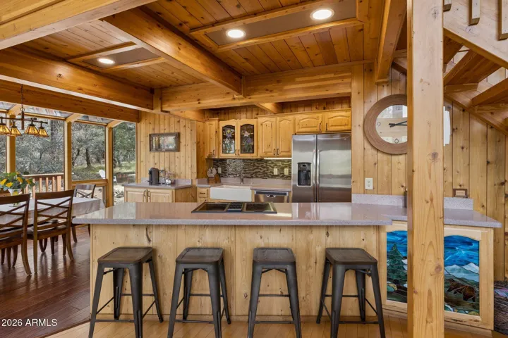 Pull up a stool at the center island while your host prepares a meal.