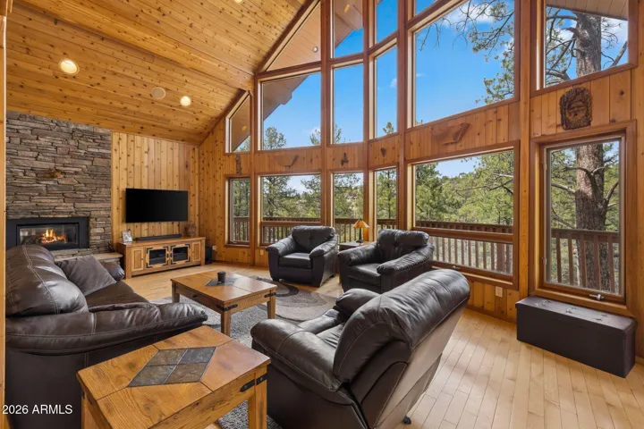 Enjoy the gas fireplace while gazing at the forest all around you.
