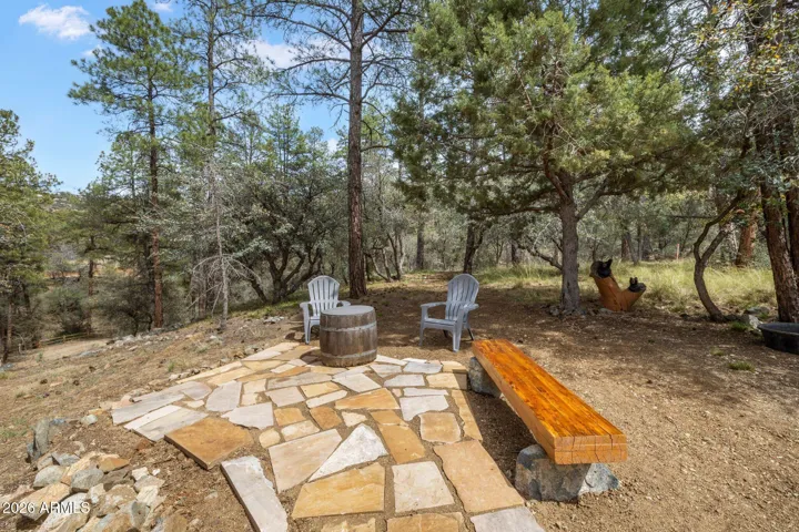 Outdoor sitting area in front of the home.