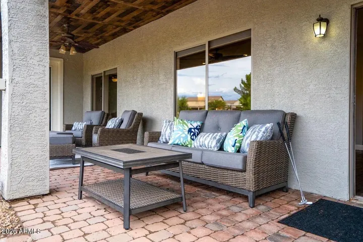 Nice backyard covered patio looking out to pool, spa, and fantastic backyard.
