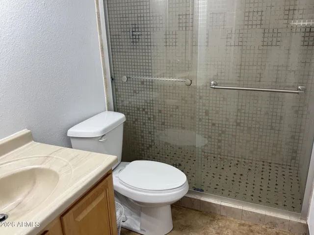 Master bath has fully tiled surround and floor in tile