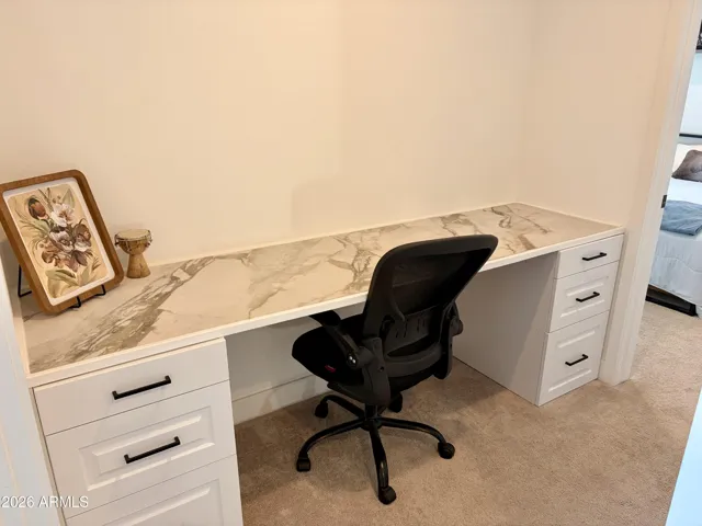 Upstairs built-in work station by bedrooms with marble top