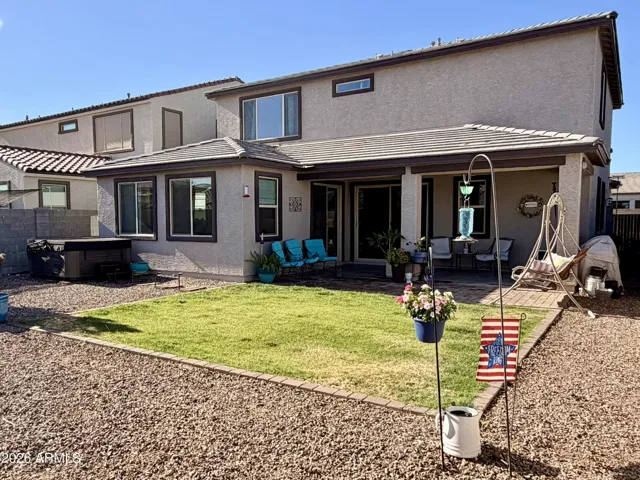 Professionally landscaped with natural grass