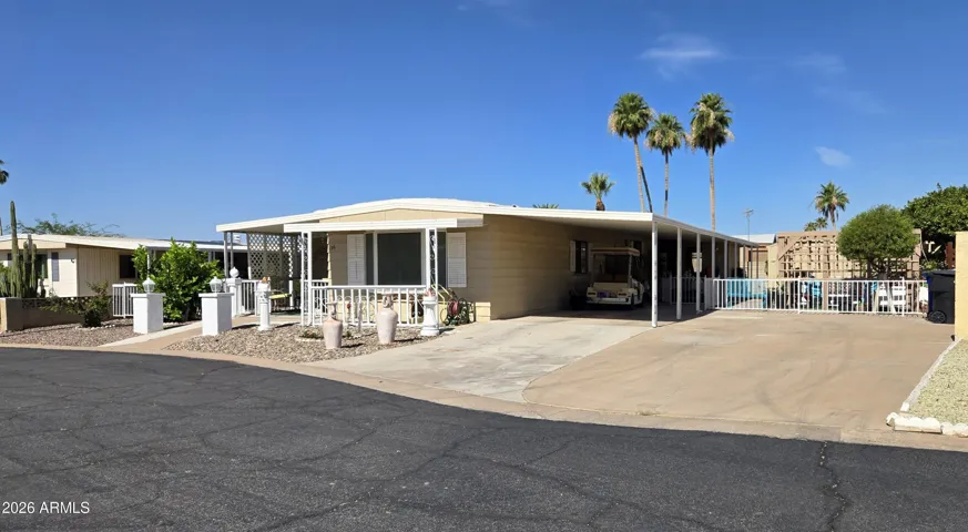 Front of property, driveway, golf cart