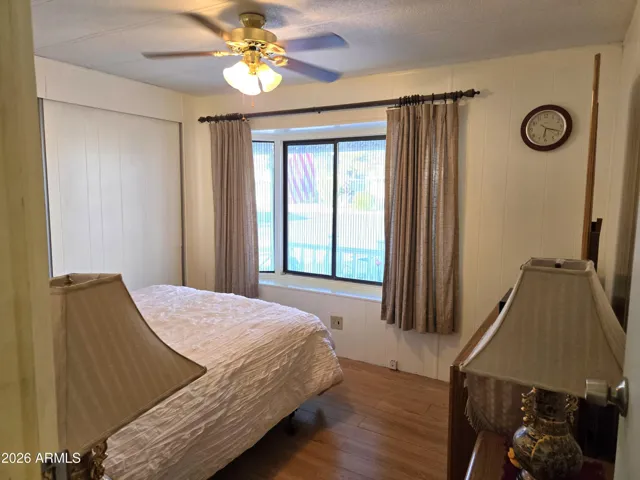 Bedroom 2, picture window facing east/front of house