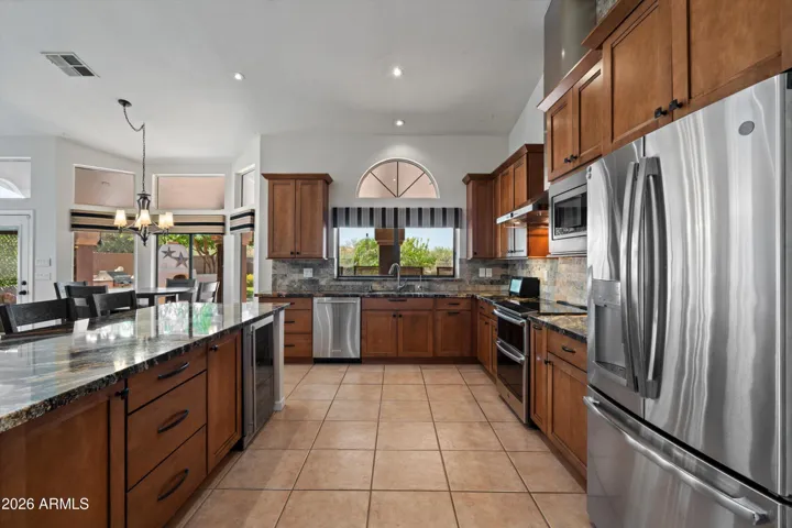 Peep the wine fridge in the island