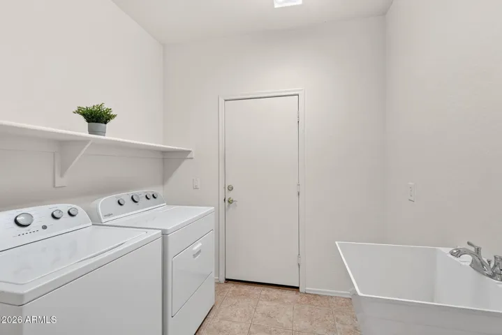 Laundry room with sink.