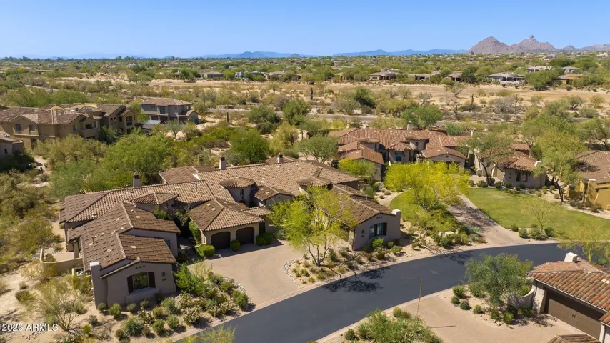 Aerial view- beautiful landscaping that you don't need to maintain!