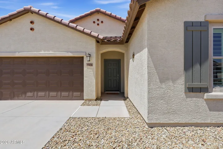 The shutters match the front door