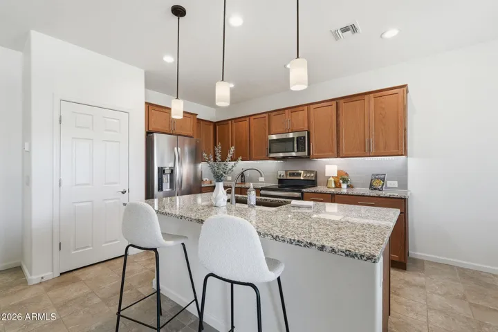 Lots of cabinets and counter space in the kitchen and a pantry