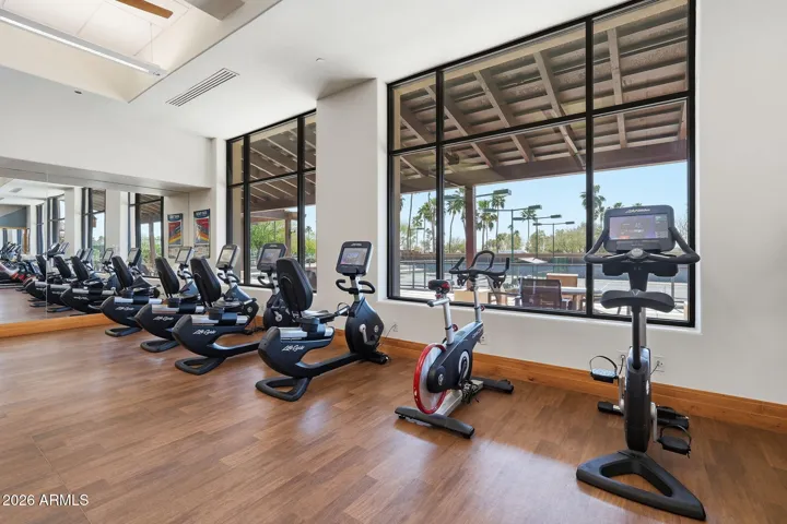 There is a cardio room with plenty of equipment
