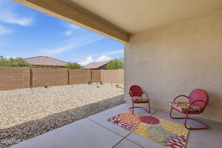 Sit out on the back patio. There is plenty of room to add a table and chairs.