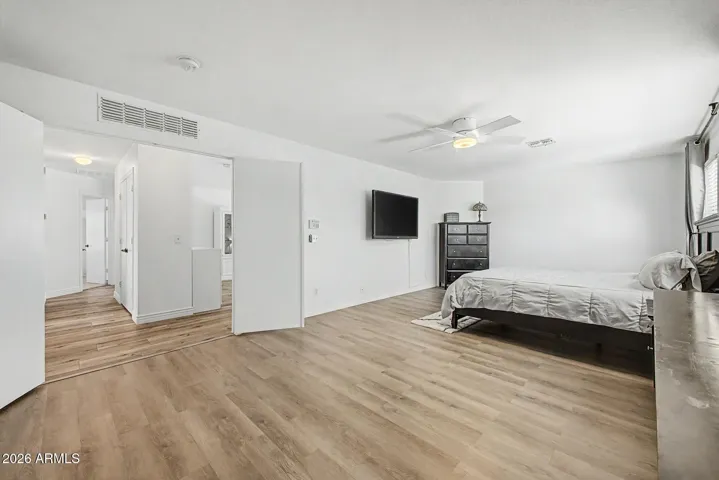 Generous primary suite with room for a sitting area or additional furnishings.