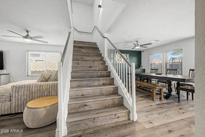 Functional layout with open sightlines and upgraded flooring throughout.