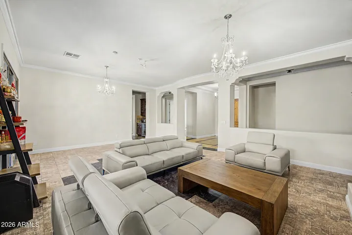 Open formal living & dining room, views to foyer & office