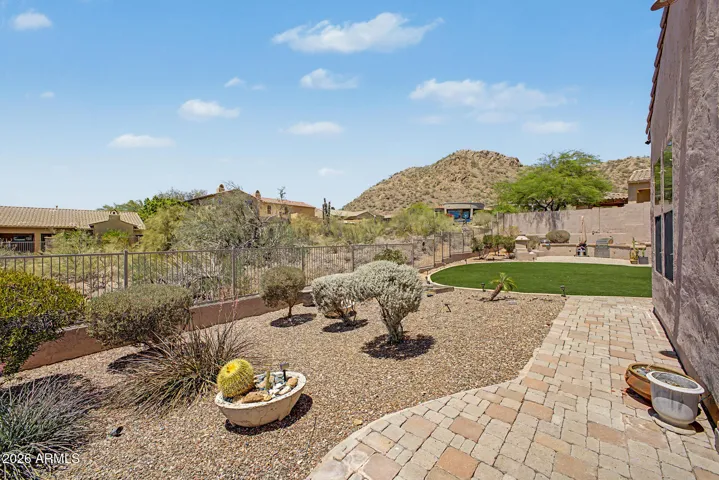 Desert wash & mountain views create a breathtaking backdrop