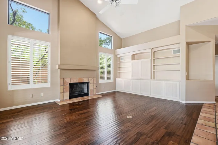 Family Room with fireplace, vaulted ceilings and built-ins