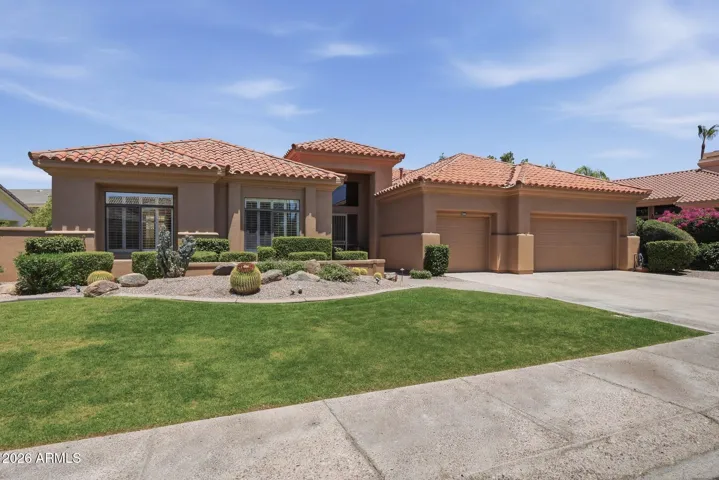 Exterior front with 3 Car Garage