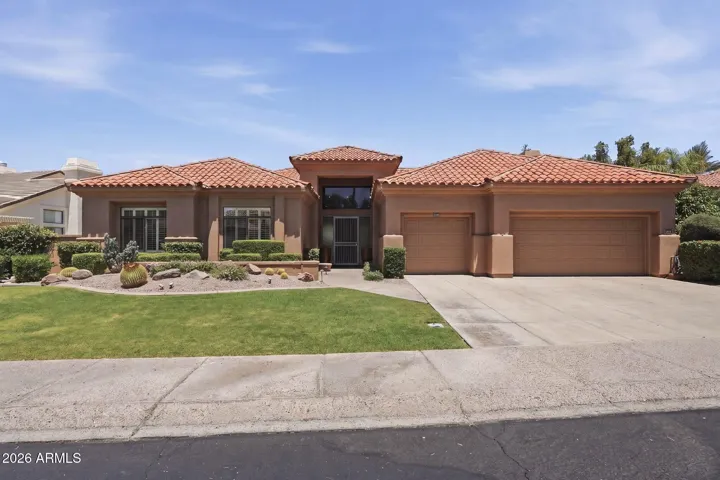 Exterior front with 3 Car Garage