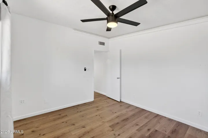 Large closet with built in storage system.