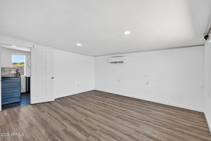 Spacious Primary bedroom with extra mini split, large primary suite with in unit laundry.