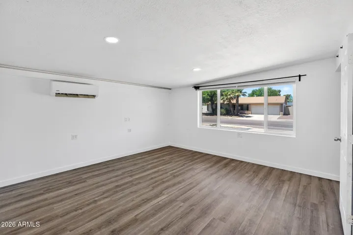 Spacious Primary bedroom with extra mini split, large primary suite with in unit laundry.