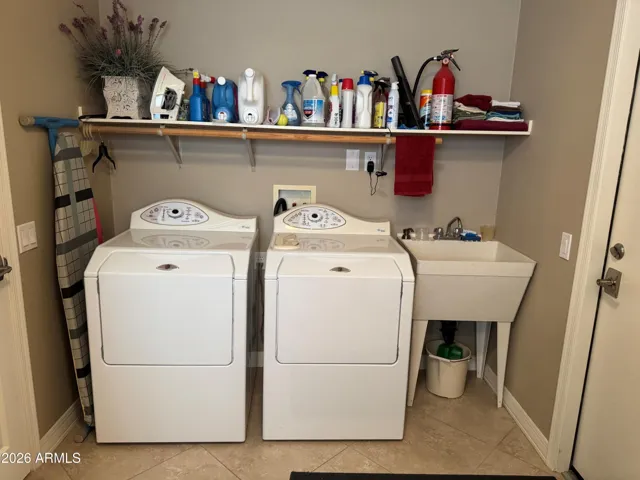White Maytag Washer and Electric Dryer Included.