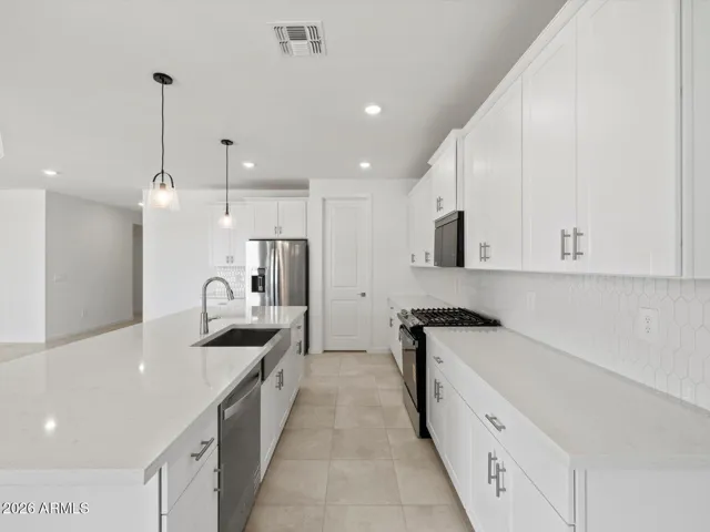Photo is not of the actual home. Interior finishes and fixtures may vary.