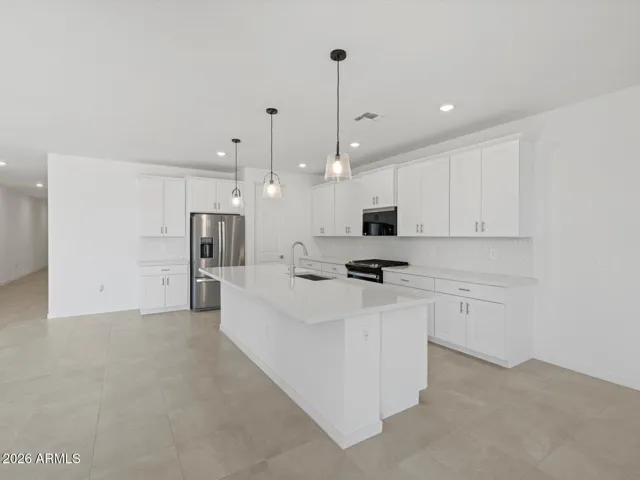 Photo is not of the actual home. Interior finishes and fixtures may vary.