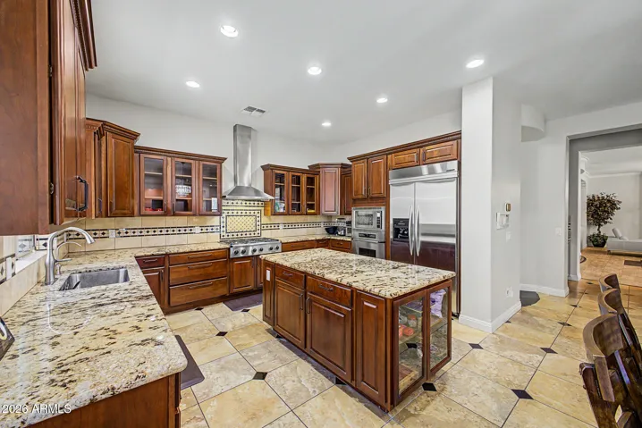 Large island, granite slab counters & stainless appliances,