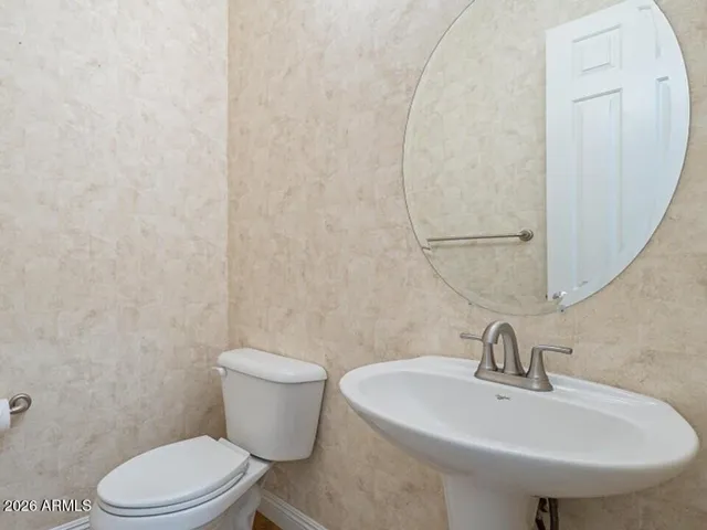 Powder room offers both style and convenience for guests