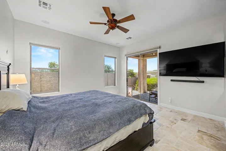 Large primary bedroom with access to your own private patio & sitting area