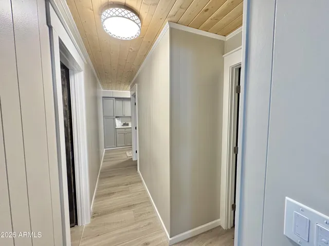 HALLWAY TO BEDROOMS AND BATHS
