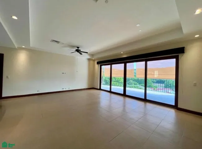 Ample living area that extends to the terrace with central air conditioning and fan.
