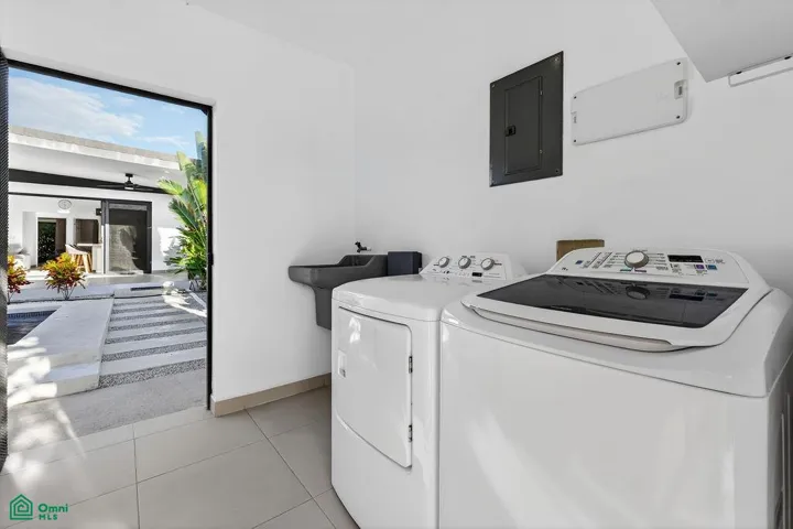 Laundry Room wit Pool View from Garden Access