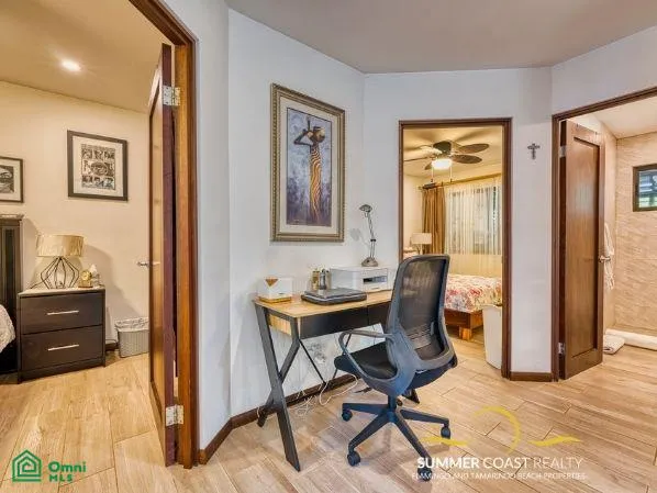 hallway with desk