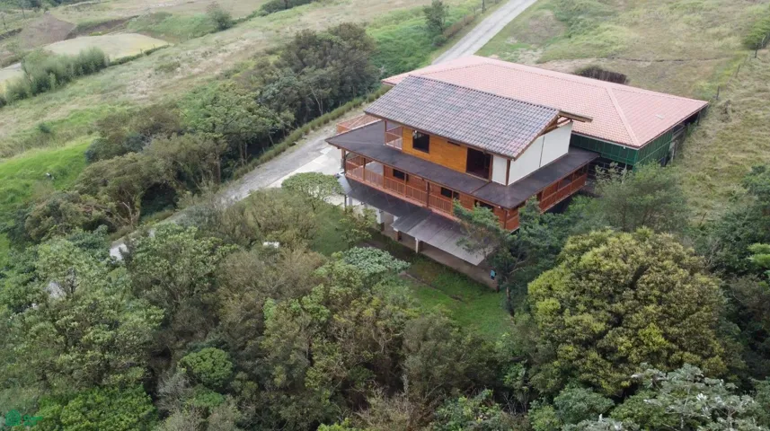 Luxury mountain-style residence with private equestrian training arena, spacious terraces, and panoramic nature views. Built with high-quality wood finishes and anti-seismic construction.