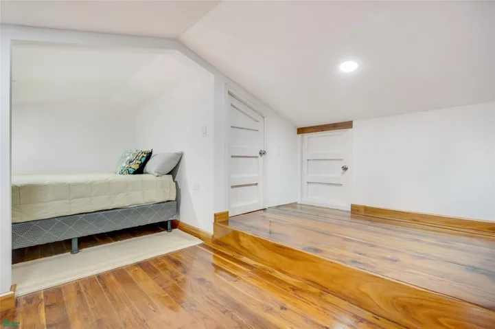 Loft bedroom and closet.  Now with new  bedding.