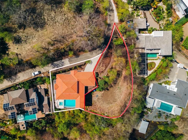 Additional land to build a 2-bedroom Casita. Plans included.